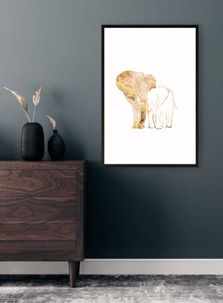 Framed White Gold Elephants 2 art print hanging above a dark wooden dresser in a modern room.
