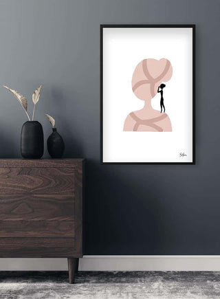 Sara Sonne- Listen art poster in black frame on a dark grey wall above a wooden dresser with decor.