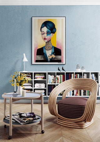 Modern living room featuring Harmony by Martin Zen on the wall above a stylish chair and bookshelf.