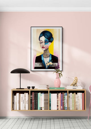 Framed Harmony by Martin Zen on a pink wall above a modern shelf with books, lamp, and vase.