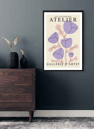 Framed "Purple Puppies - Vincent V Plakat" art print with abstract purple flowers on a modern living room wall.