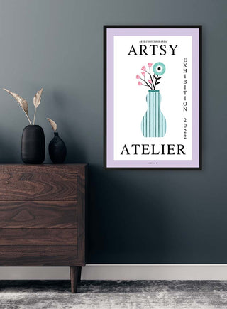 Framed Blue Vase - Vincent V. print on a dark gray wall above a wooden dresser with minimalist decor.