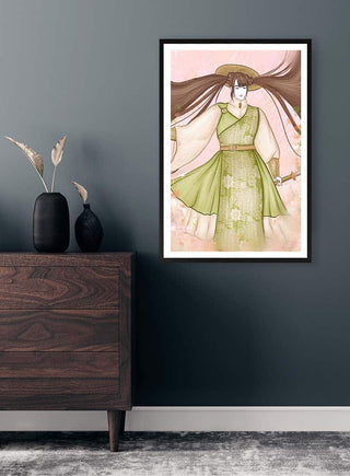 Framed art print of The Japanese Jewel - Kate Aitana hanging above a wooden dresser in a modern room.