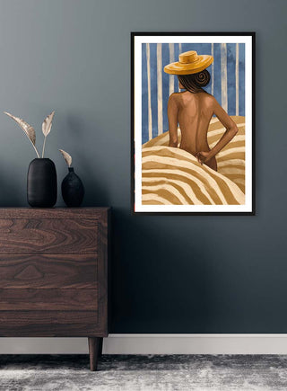 Framed Golden - Vincent V art print on a dark wall, featuring a woman in a hat with striped bedding.