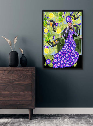 Colorful "Frida in the Garden" artwork featuring Frida in a floral dress with monkeys, displayed on a modern wall.