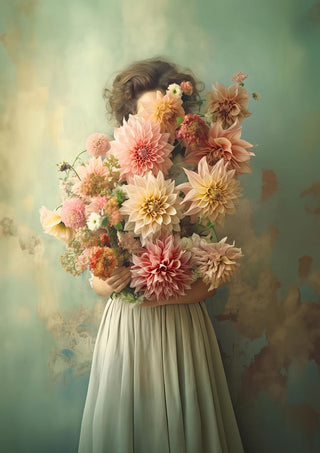 Woman holding a large bouquet of dahlias in soft pink and peach tones, vintage green background.