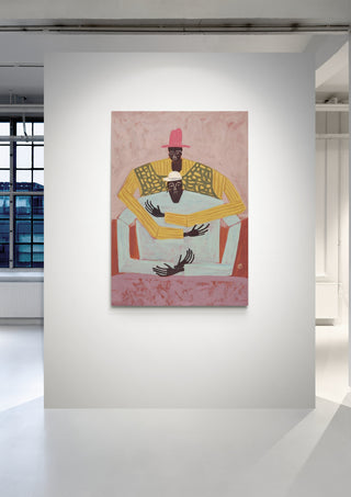 The Hug artwork by Studio IMO displayed on a white gallery wall with large windows in the background.