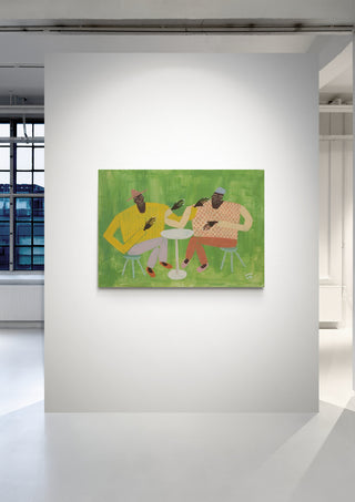 Painting of three people sitting together on green background, displayed in a bright gallery space.