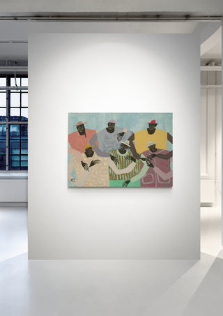 Colorful painting of four abstract figures hanging on a white gallery wall in Group Chat - Studio IMO product page.