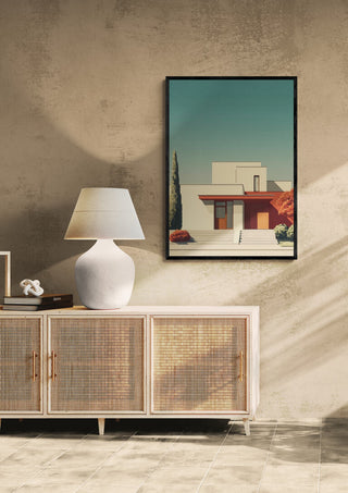 Framed Floria Keys by David Wolf displayed above a sideboard with a lamp in a modern interior setting.
