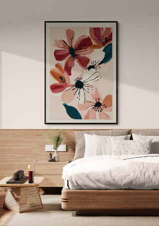Framed "Blush and Wine Blossoms II" floral artwork by Branka Kodžoman hanging above a modern bed.