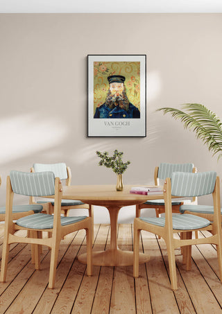 The Postman - Van Gogh art print hanging above a dining table with four chairs in a modern room.
