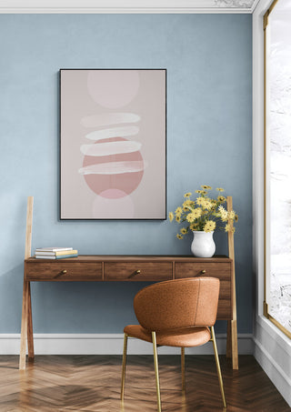 Minimalism 18 artwork featuring abstract shapes, displayed above a wooden desk in a modern, light-filled room.