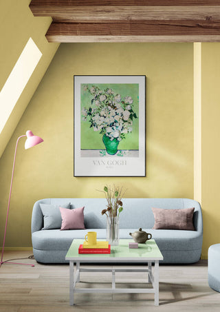 Van Gogh's "Roses" artwork in a modern living room, hanging above a light blue sofa.