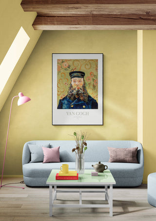 Framed "The Postman" Van Gogh print displayed above a modern sofa in a stylish living room setting.
