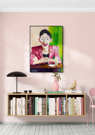 Framed "I See You - Martin Zen" artwork hanging above a shelf with books and decor in a modern room.