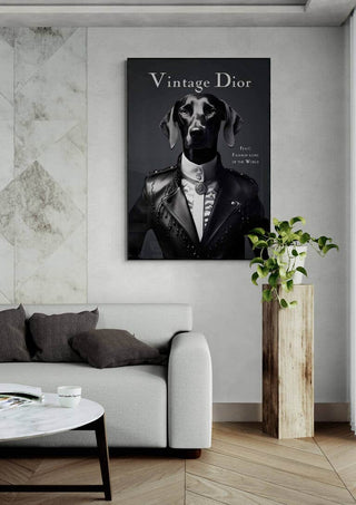 Vintage Dior wall art featuring a dog in a suit, displayed above a modern sofa in a stylish living room.