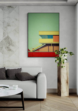 Modern living room with Flat Bauhaus by David Wolf artwork on the wall above a white sofa and potted plant.