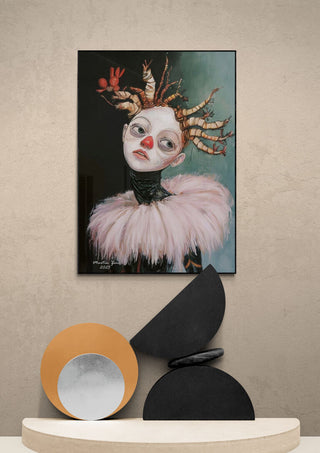 Framed "Naughty With Nature - Martin Zen" artwork hanging above modern geometric decor on a beige wall.